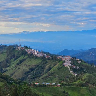 Mountain village in the Andes of Tolima, Colombia surrounded by green hills and valleys