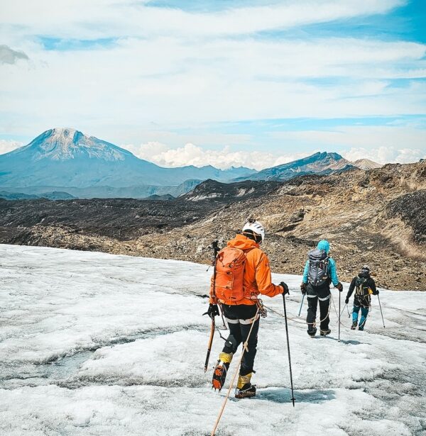 Climbers roped together crossing glacier in los Nevados Colombia