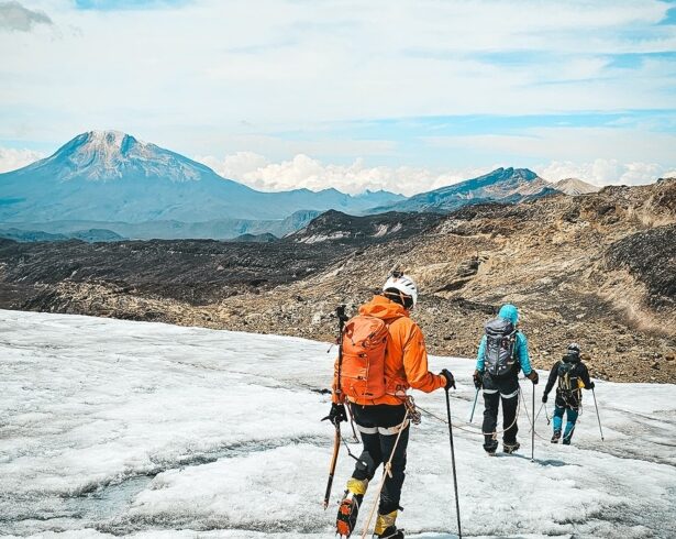 Climbers roped together crossing glacier in los Nevados Colombia