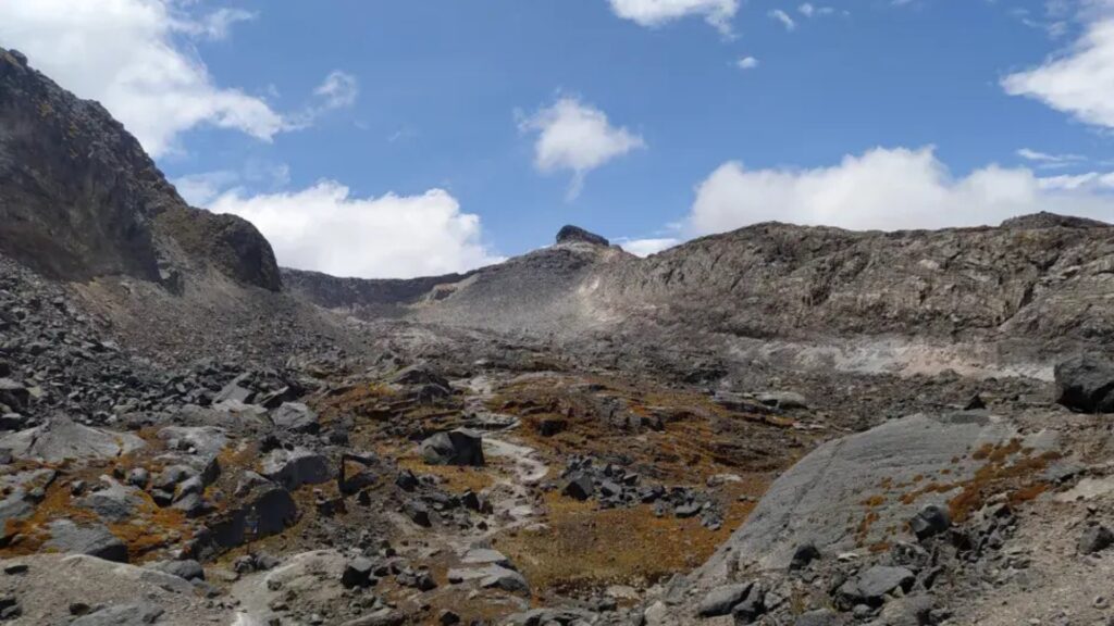 Rocky valley exposed by the retreat of Conejeras Glacier on Nevado Santa Isabel, Colombia.
