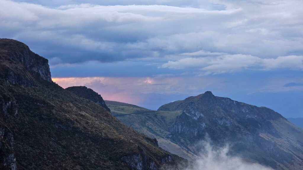 Mountain ridges and cloud-filled valleys in Los Nevados National Natural Park during a high-altitude trekking expedition in Colombia.
